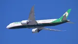 EVA Air Boeing 787-9 B-17889 climbing in a three-quarter view against a clear blue sky, showing its longer body, raked wingtips, and saw-tooth-edged engine pods.