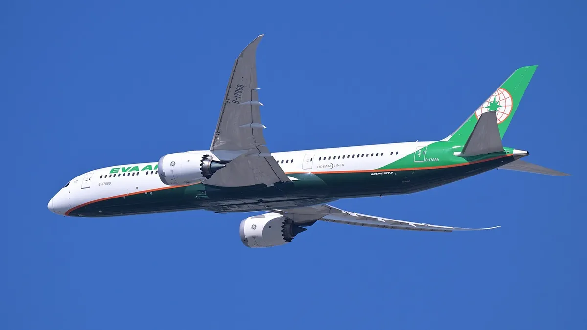 EVA Air Boeing 787-9 B-17889 climbing in a three-quarter view against a clear blue sky, showing its longer body, raked wingtips, and saw-tooth-edged engine pods.